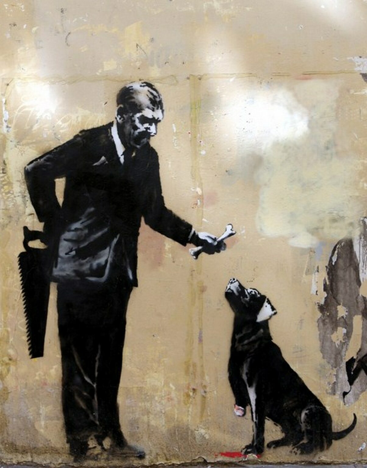 Banksy Man with a saw and dog
